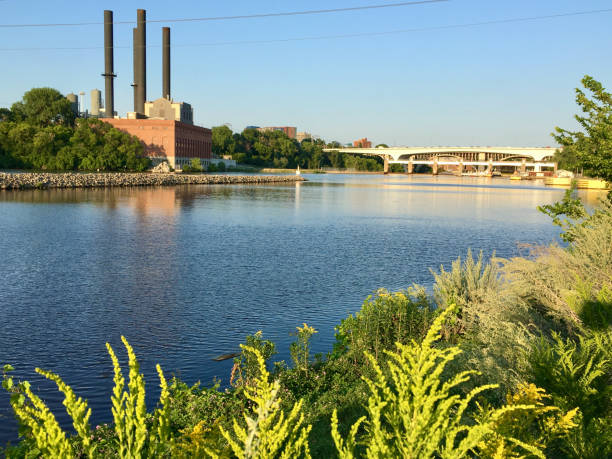 istock Industrial Power Plant by the River Landscape 2161006596
