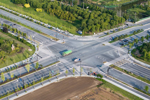 Free Stock Photo of Aerial view of suburban road through green ...