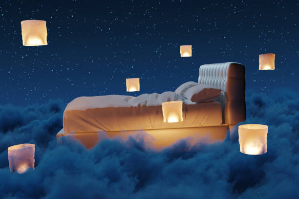 istock Cosy bed illuminated by sky lantern. The bed flying over fluffy clouds at night. 3D Rendering 2161009730