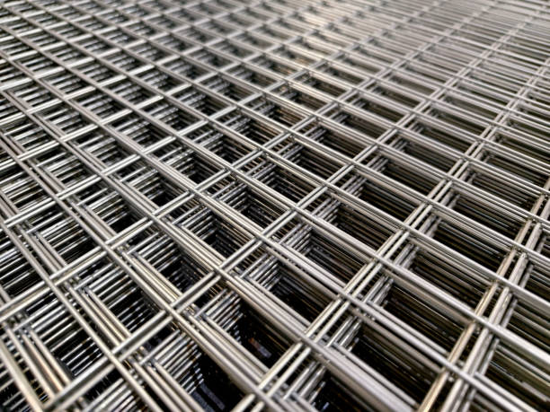 istock Steel chain link fence wire mesh texture and pattern 2161010278