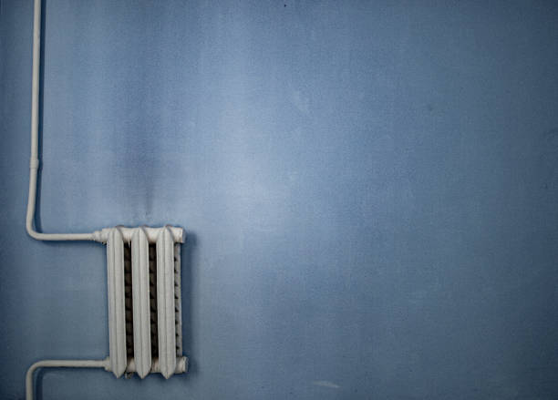 An antique battery on a bare old wall