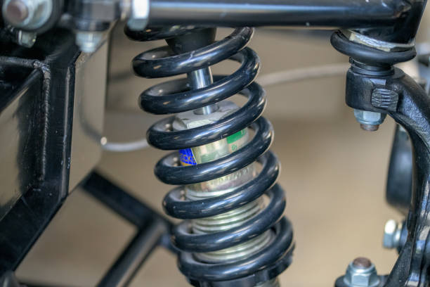 istock Black suspension coil spring, shock absorber, fitted to a vehicle 2161020055