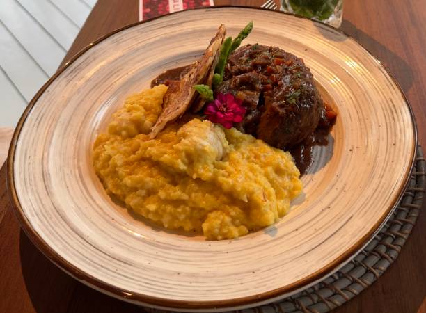 istock Braised Beef Short Rib With Creamy Polenta and Crispy Bread 2161024950