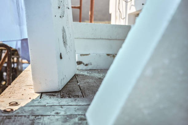 istock White polystyrene foam board blocks for heat insulation ready at construction site, closeup detail 2161026378