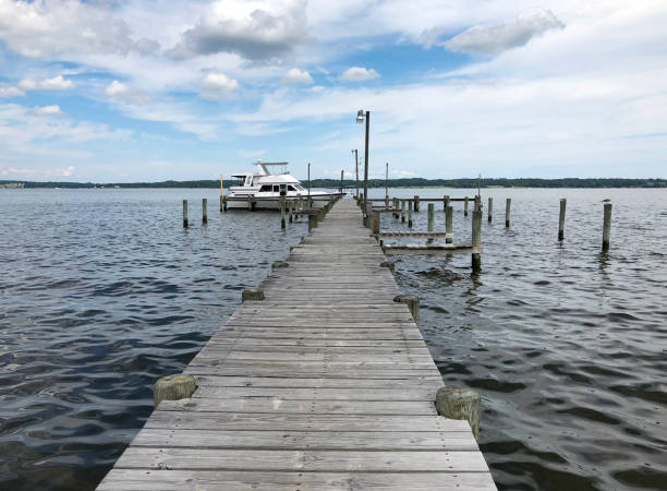 A row of ships with their masts high at Saint Michael's harbor, Maryland