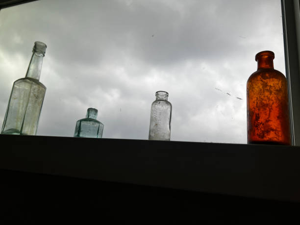 istock Vintage Bottles in Window Display 2161032394