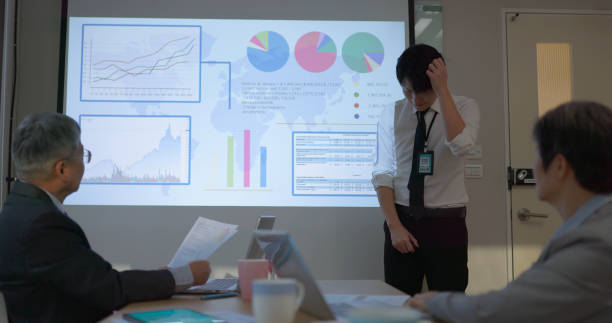 istock businessman do presentation in boardroom 2161034916