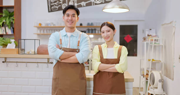 istock couple cafe small business owners 2161036994
