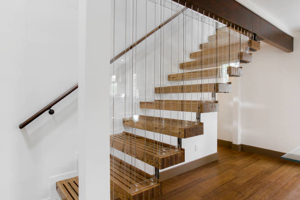 Modern Open Staircase With Wooden Steps And Sleek Design Elements
