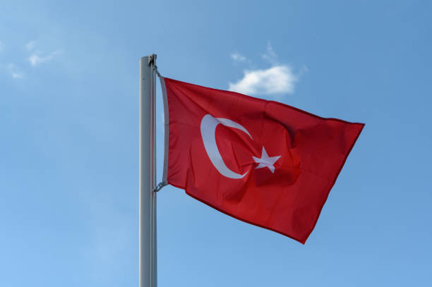 istock Turkey flag against blue sky 1 2161043341