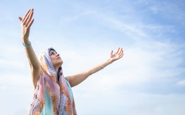 Blue sky at sunset and a woman wearing a white dress