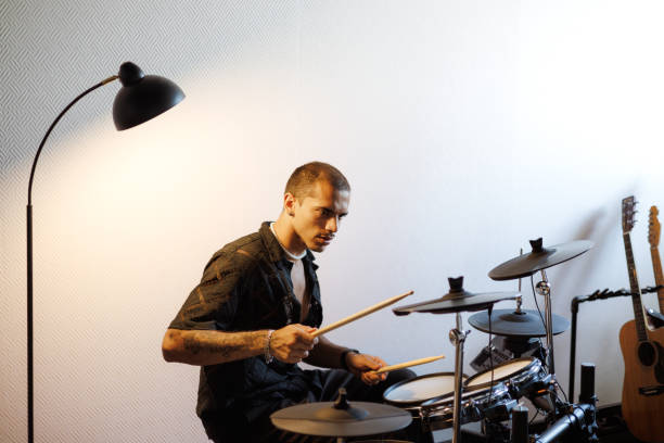 istock Multiracial musician playing drums in music studio 2161050981
