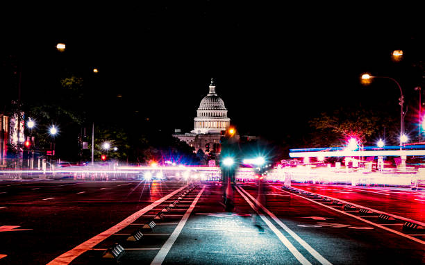 istock U.S. Capitol Building with light trails at night 2161055710