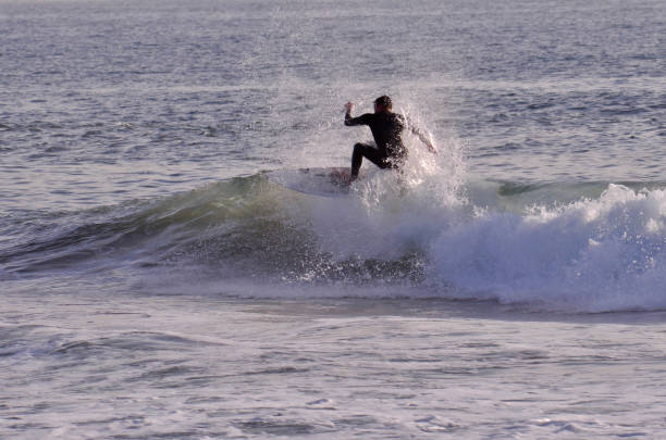 Surfer Free Falls with Whitewater