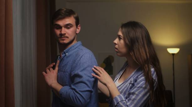 istock Couple's Tense Moment: Woman Confronting Man Over Secretive Phone Use 2161064114