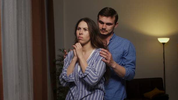 istock Dramatic Home Confrontation: Woman Distressed in Escalating Domestic Conflict 2161064412