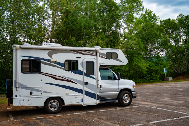 istock Side view of motorhome in parking lot 2161067627
