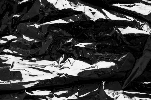 istock Black transparent plastic film wrap overlay texture background 2161069263