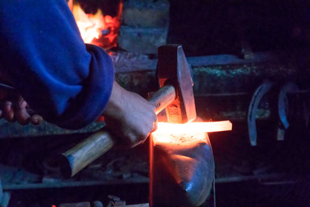Europe, Romania. Viscri. Local Gypsy blacksmith.