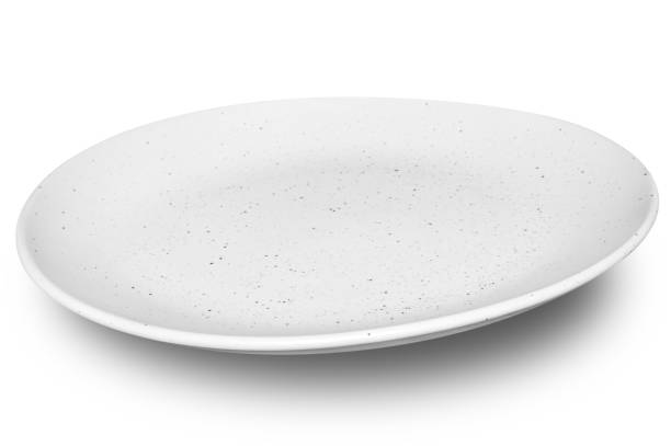 istock White circle ceramics plate isolated on white background. 2161075346