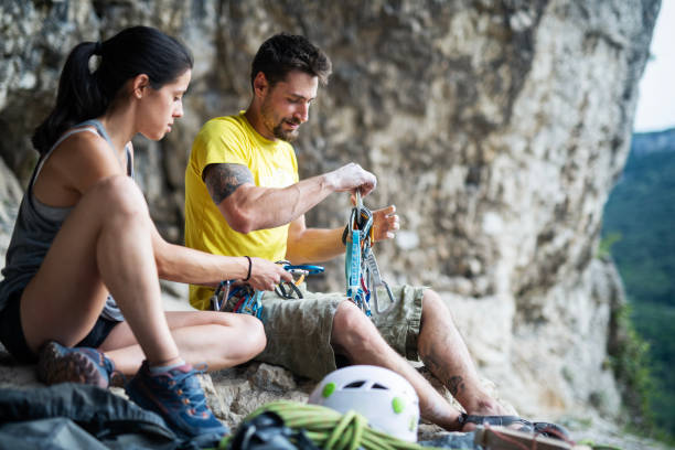 istock Rock climber couple taking a break. 2161076350