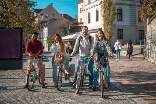 istock Diverse Group of Friends with Bicycles in Urban Setting 2161076665