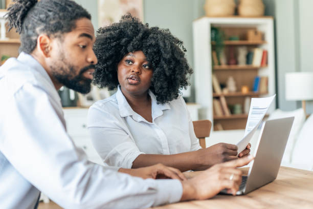 istock Couple doing their budget at home 2161077976