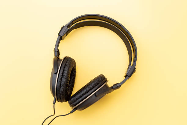istock Headphones on a yellow background 2161082482