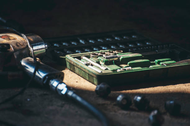 istock Mechanic tools engineering equipment car auto repair shop with copy space. Blurred background mechanical service. Heavy screw grungy rusted wrenches dirty screwdriver object. Industrial hardware set 2161082622