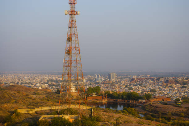 Communication tower and Jodhpur cityscape at sunset