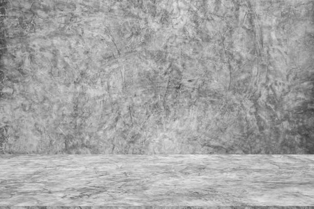 istock Wall empty studio interior background and backdrop of concrete cement wall in black and gray tones. Studio interior background and empty space Decorating ideas 2161090043