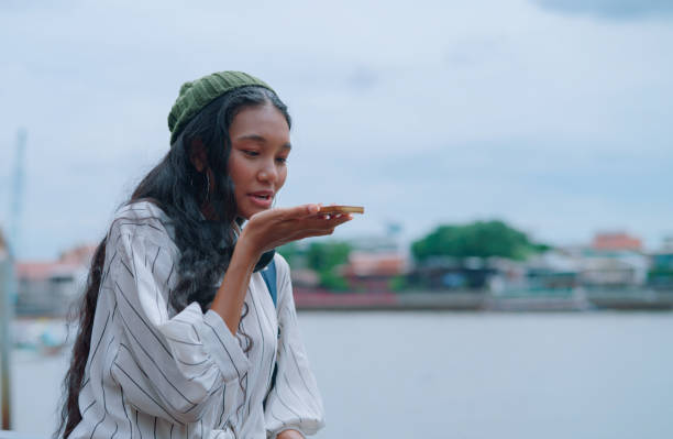 istock Asian woman using ai apps while travel 2161097758