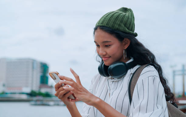 istock Asian woman using smartphone 2161098194