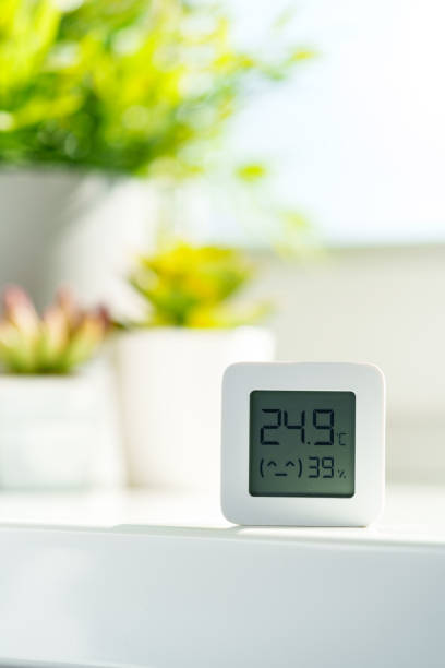 istock White Digital Thermometer Displaying Room Temperature and Humidity 2161098441