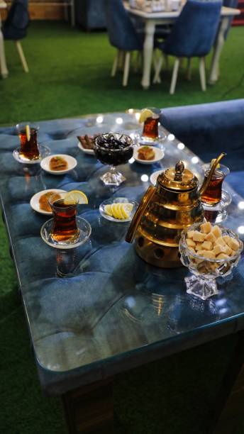 istock Tea and Snacks on a Glass Table in a Restaurant 2161101214
