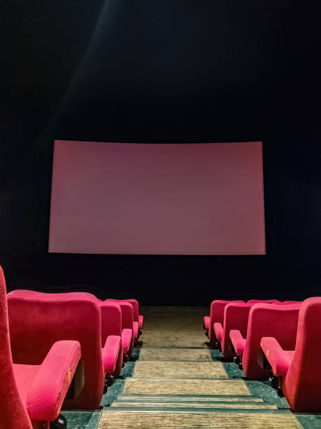 istock a large cinema room with comfortable cloth seats and a wide screen 2161103635