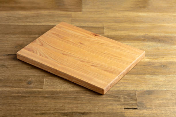istock Cutting board on a wooden table. 2161107141
