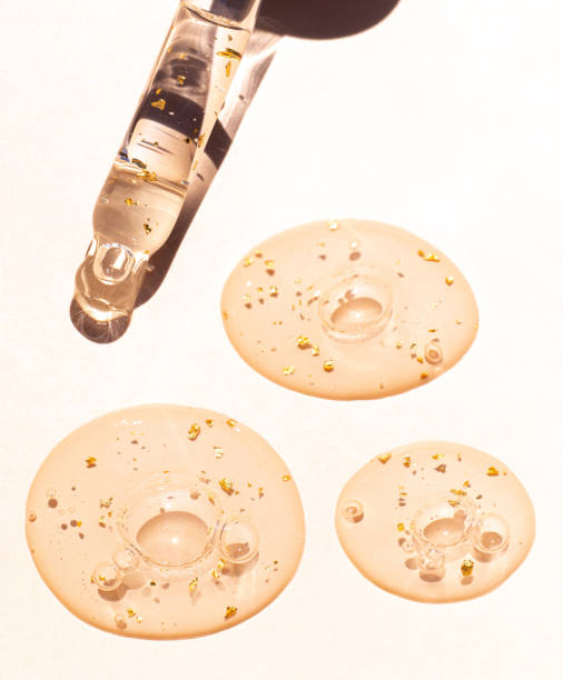 istock pipette drop of serum test on a light background sun glare 2161107322