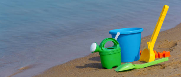 istock Colorful sand toys on the beach 2161107514