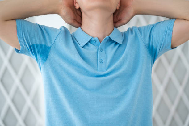 istock Man in blue polo with sweaty armpits 2161108468