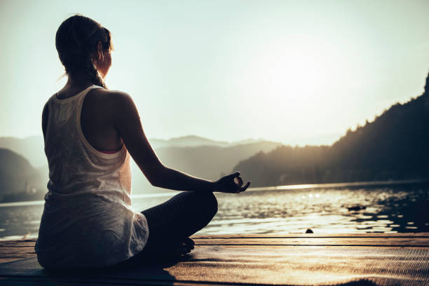 istock Woman doing yoga 2161108797