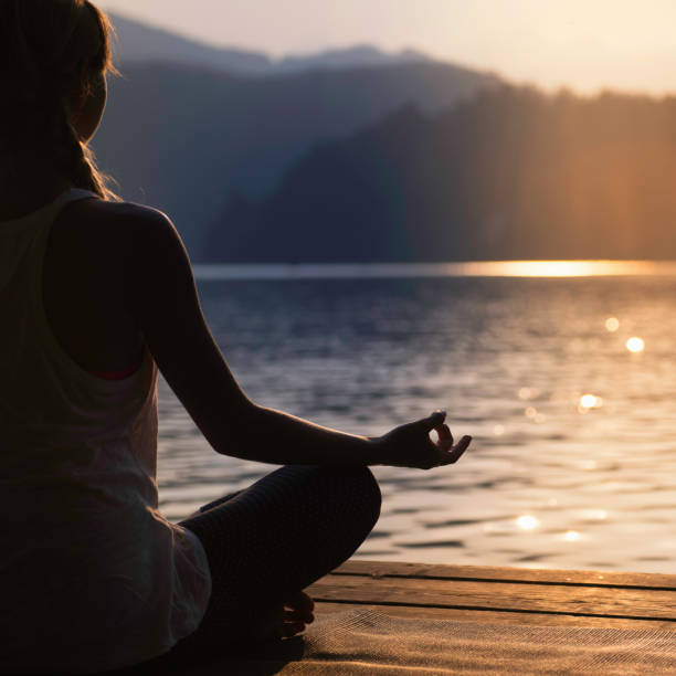 istock Meditation by the lake 2161108885