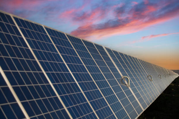 istock Solar panels power generation equipment, in the sun rays, solar panel with sunlight and sky background. concept clean energy power in nature 2161112508
