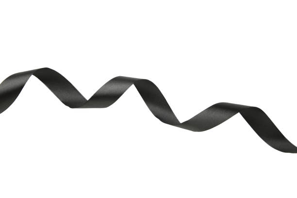 istock Black satin ribbon isolated on white background, top view 2161117445