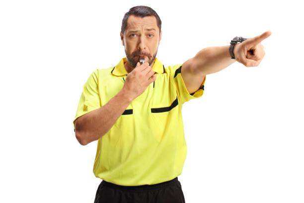 istock Sports referee blowing a whistle and pointing 2161119033