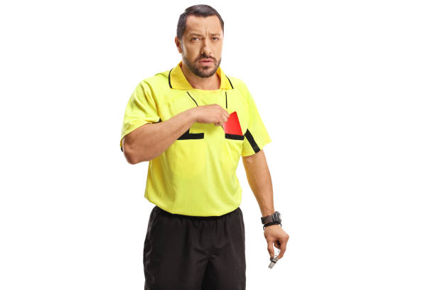 Referee gesturing to check VAR