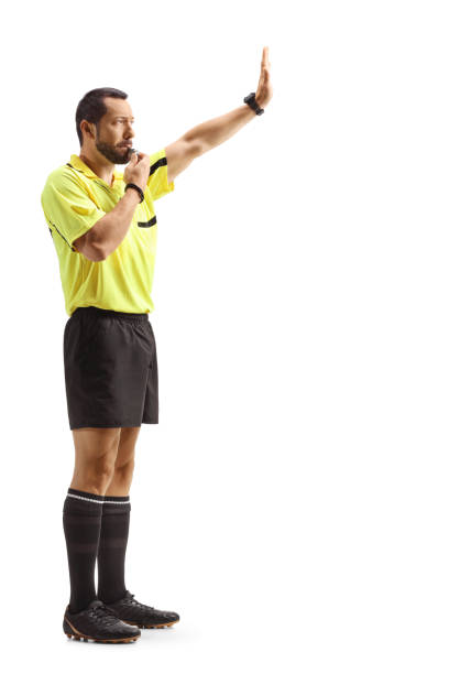 istock Football referee blowing a whistle and gesturing with hand 2161119204