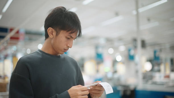 Asian man tired in inflation.