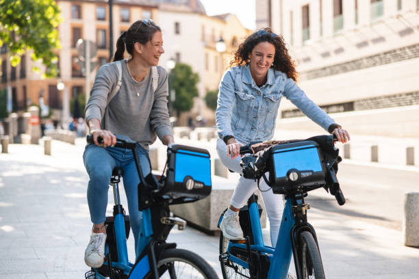 istock Two Friends Exploring Madrid on Rental Bikes 2161134672