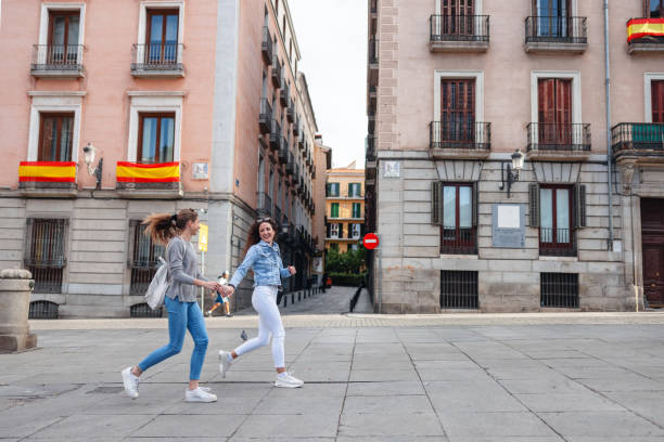 istock Two Friends Exploring Madrid Streets in Spain 2161134742